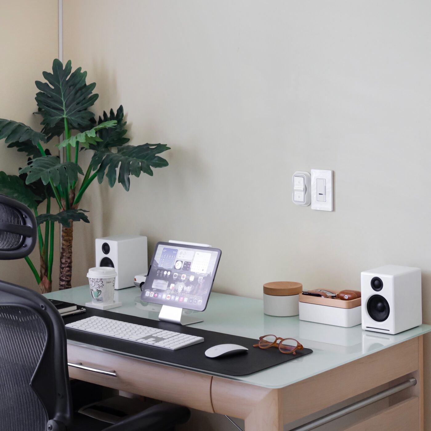Revov Coin Storage on a home office desk beside a monitor and speaker